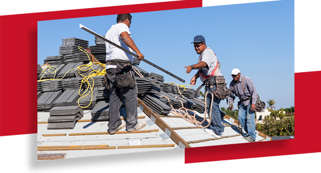 A group of men preparing to repair a roof