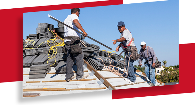 A group of men preparing to repair a roof