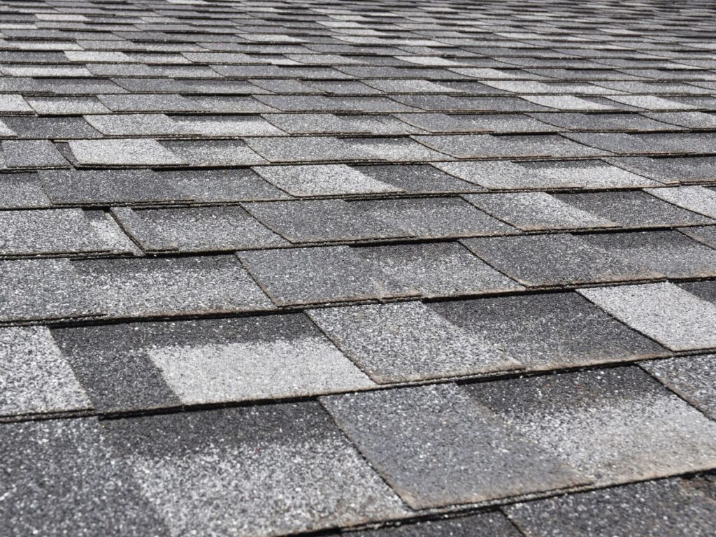 A close up of a roof shingles.