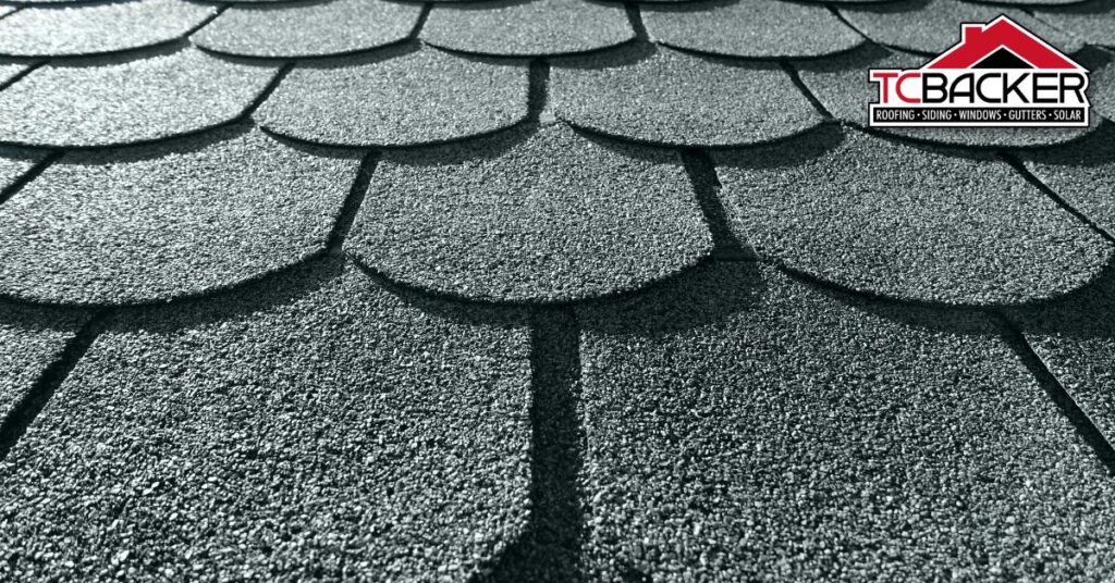 Close-up of textured roof shingles.