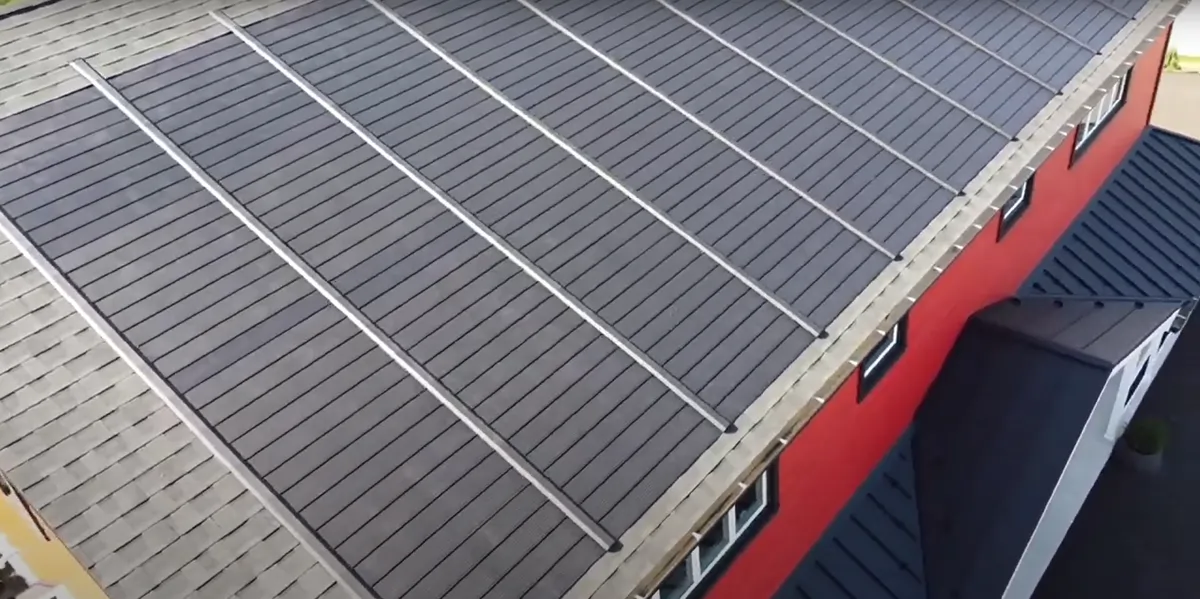 Close-up of nailable GAF Timberline Solar shingle rows on a residential roof